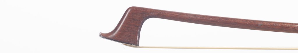 The head of a Hill bow in profile